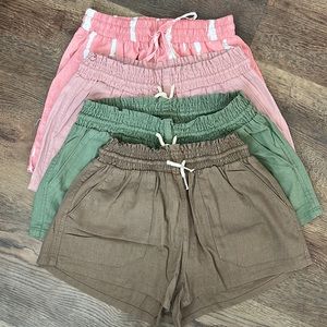 Set of 4 size Medium shorts purchased at a local boutique. They are adjustable.